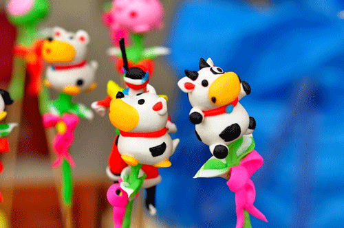 Colorful traditional To He toys - Hanoi Travel Guide