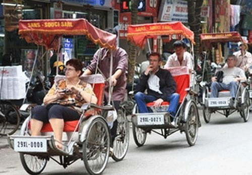 Cyclo in Hanoi - Vietnam Travel Guide