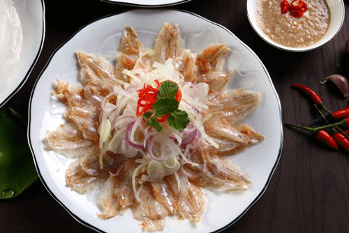 Raw herring salad - Mui Ne Travel Guide