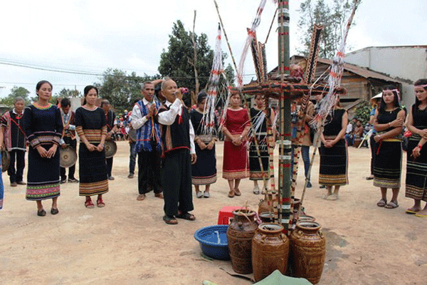 The village elder prays for a good crop next year - festival in Central Highlands