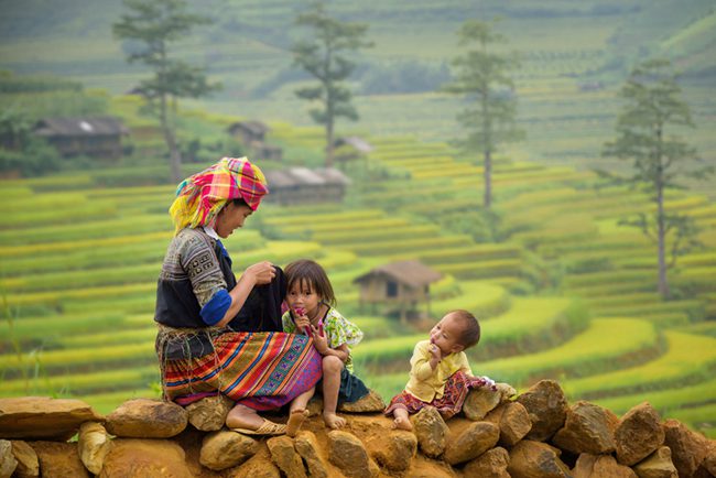 Local Mong and Thai communities in Mu Cang Chai sharing a warm moment