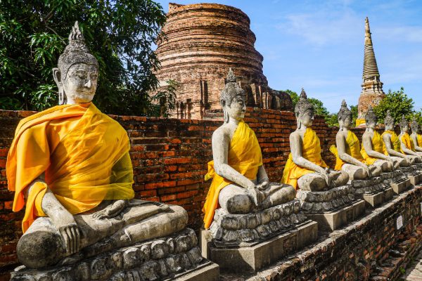 Buddha statues with yellow robe at Wat Yai Chai Mongkhon Temple.
