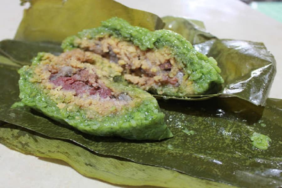 Ta Van Village honors Tet with the iconic Bánh Chưng Gù dish.