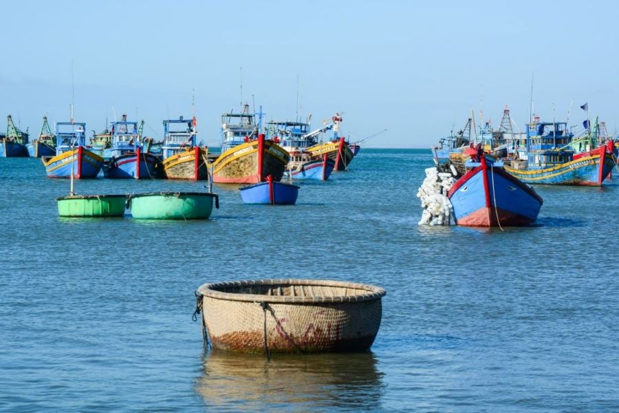 Colorful boats line Binh Dam, echoing traditions of fishing villages in Vietnam