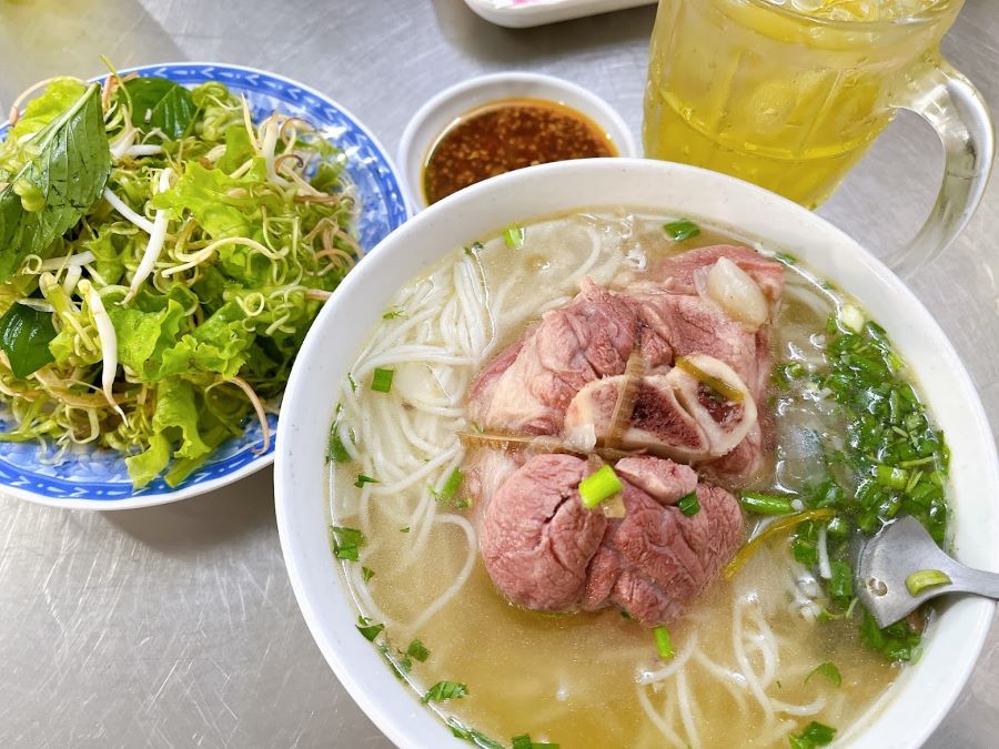 Cu Chi Tunnels Tour includes tasty stops like Minh Quý’s pork leg noodles.