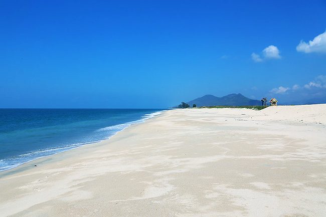 Calm water and white sand at Nabule Beach