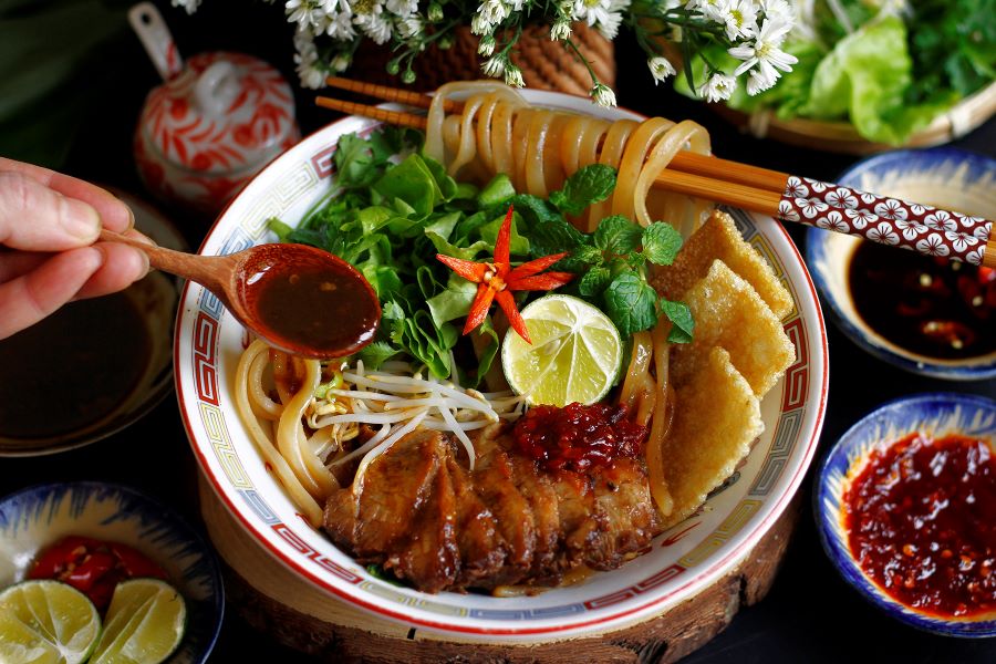 Taste tradition: Three Bowls One Vietnam, enjoying Hoi An’s iconic Cao Lau delight.
