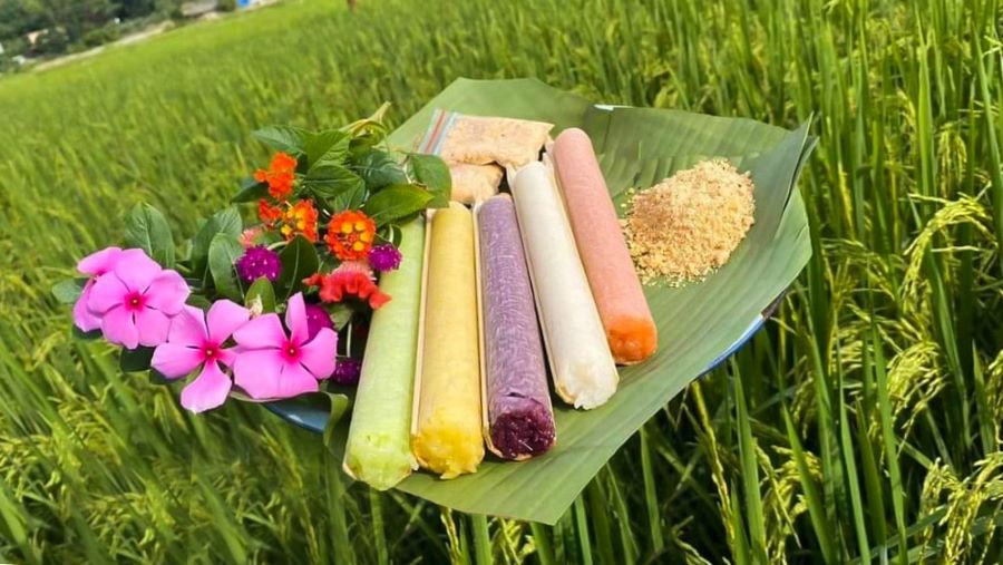 Savor Com Lam’s smoky aroma with every Mai Chau Vietnam travel bite.