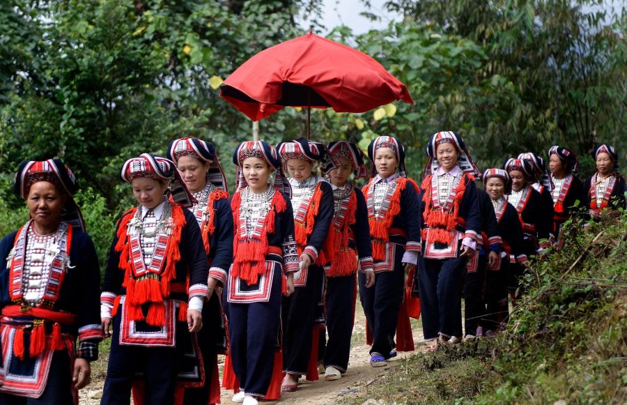 Dao People’s wisdom shines through vibrant clothing and deep-rooted spiritual beliefs.