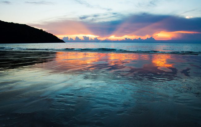 Emerald water of Dam Trau beach