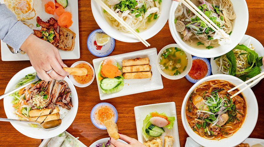 Travel Vietnam with kids and taste delicious banh mi and warm pho together