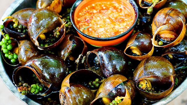 Grilled snails with peppers