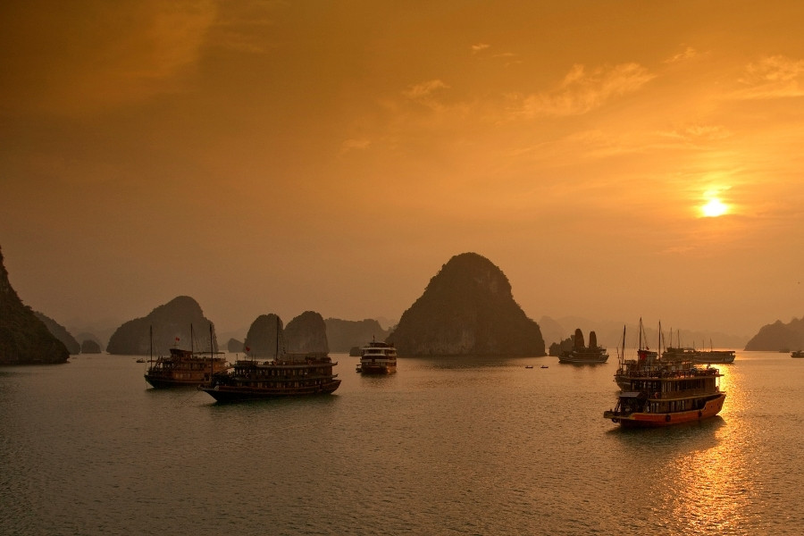 Admire sunset during 3 days cruise in Ha Long Bay.