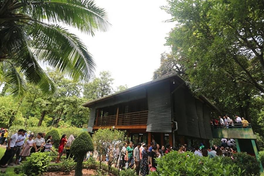 Visiting Uncle Ho's simple house on stilts.