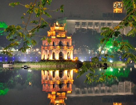 Hoan Kiem Lake, located in Hanoi center area - one of the most beautiful places you will visit in your 'Saigon to Hanoi highlights tour' in 12 days