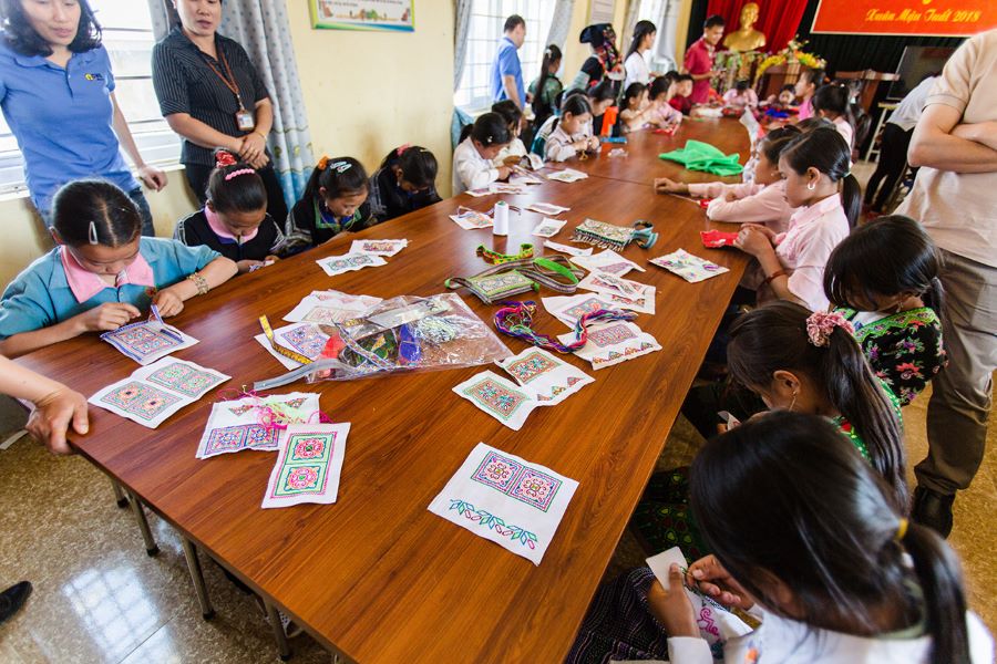 Hmong People’s children attending school, preserving language and culture through daily education.