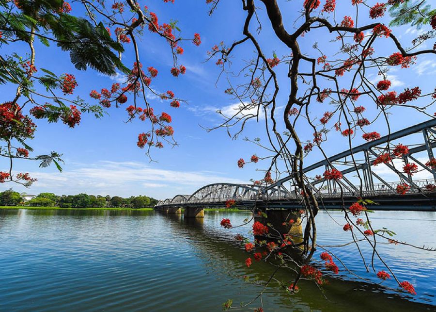 Huong River gently embraces the historic walls of Hue Ancient Citadel.