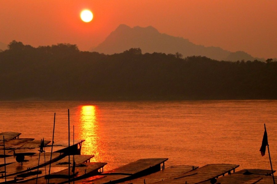 Sunset over the Mekong River between Laos and Thailand