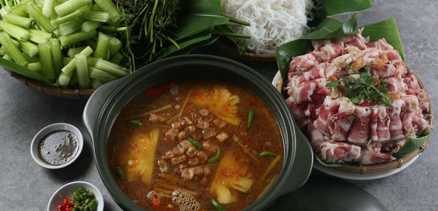 Three Bowls One Vietnam, savoring Lau Bo Nhung Mam Ruoc’s rich, savory flavors together.