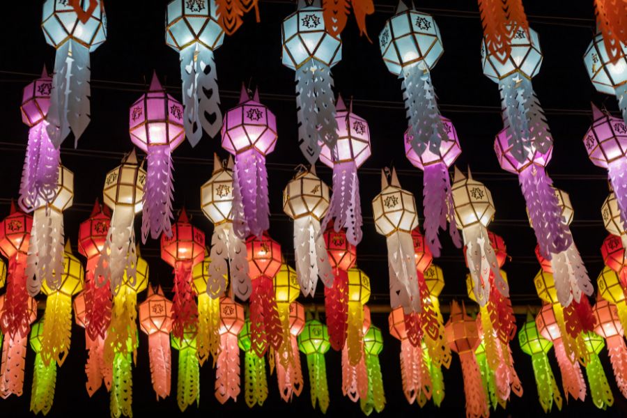 Colorful hanging lanterns light up the night during the Loy Krathong festival in Thailand