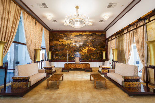 Diplomatic athering room inside the Reunification Palace, with lavish furniture.