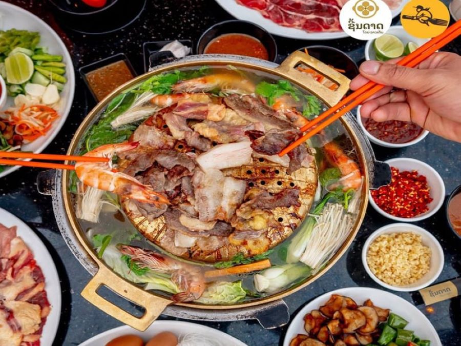 Sin Dat delivers smoky goodness-interactive Laos food tradition at its tastiest