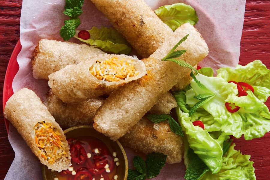 Enjoy Vietnamese fried spring rolls, where every bite delivers crisp, flavorful perfection when travel to Vietnam