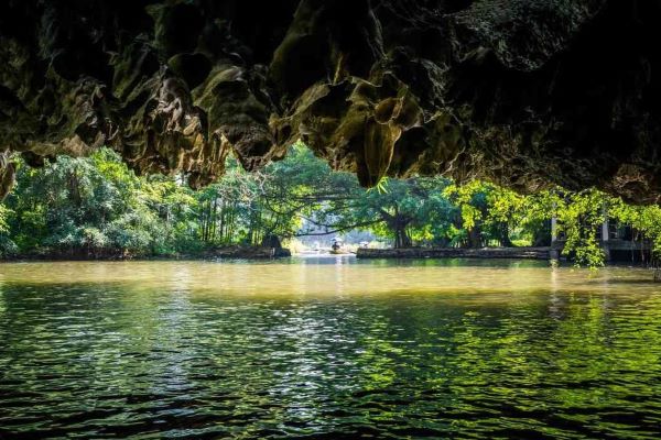Exploring the caves by boat promises to be an intriguing venture in Tam Coc, Vietnam.