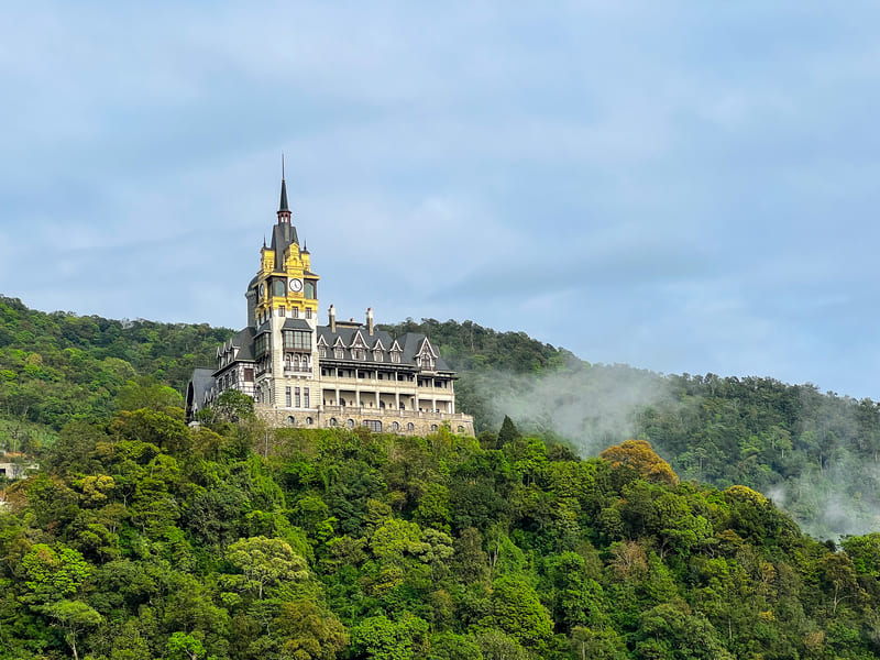 Tam Dao hillscape with European-style castle view on a misty morning - tam dao tour
