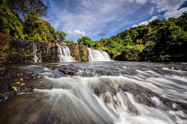 Mo Waterfall cascades in Mu Cang Chai’s forested hills