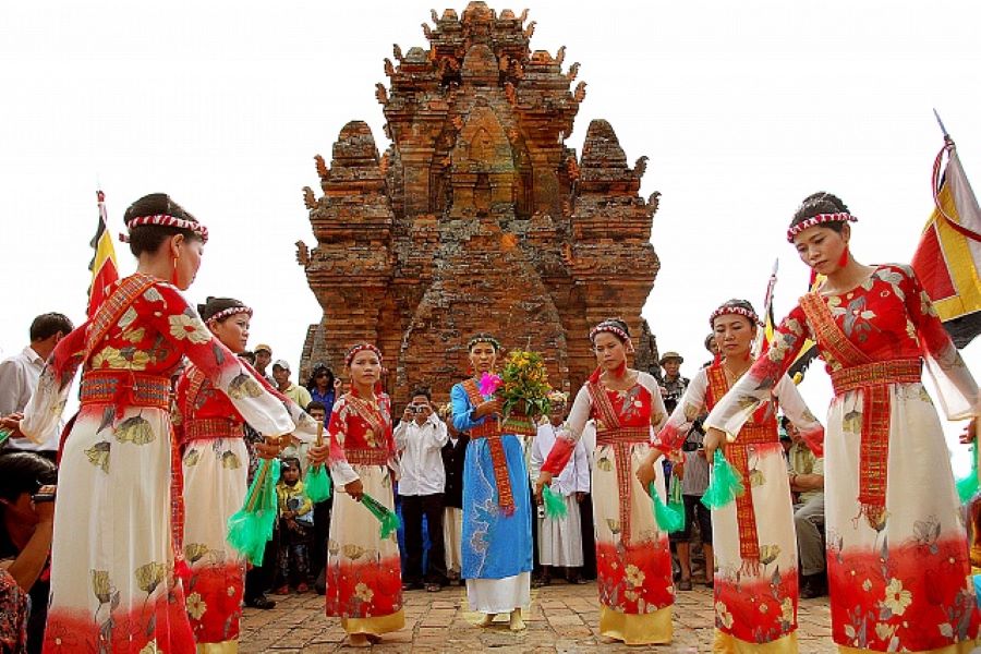 Cham people showcase elegant traditional attire, celebrating centuries of history and artistry.