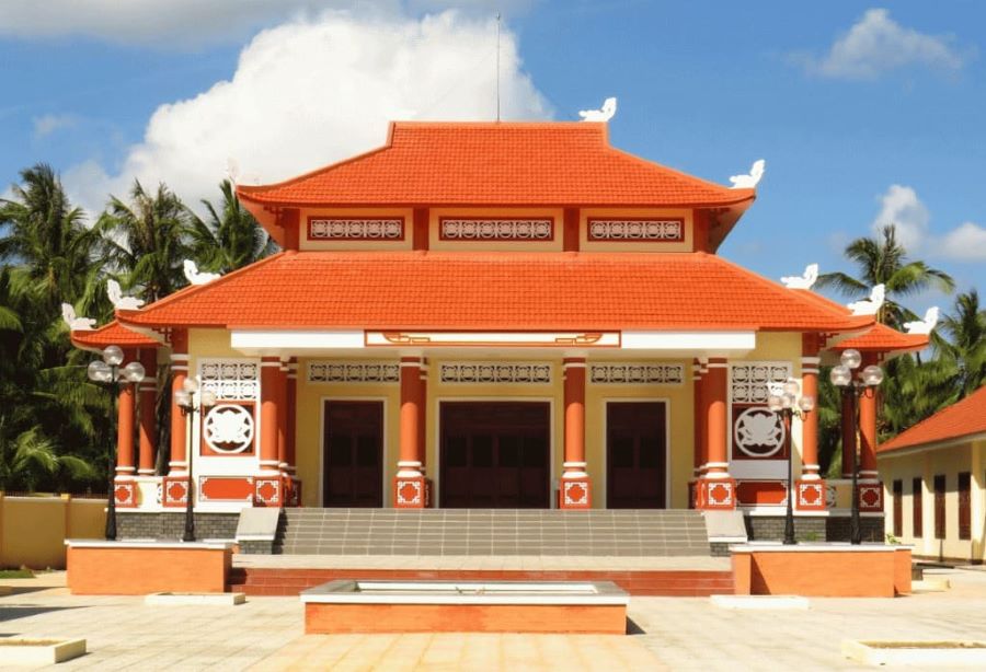 Sunlight warms the ancient roof of Tuyen Linh Temple with quiet grace.