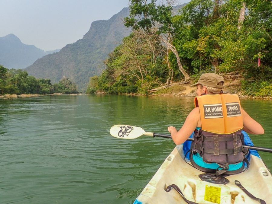 Why visit Vang Vieng? Paddle through paradise surrounded by cliffs and calm waters