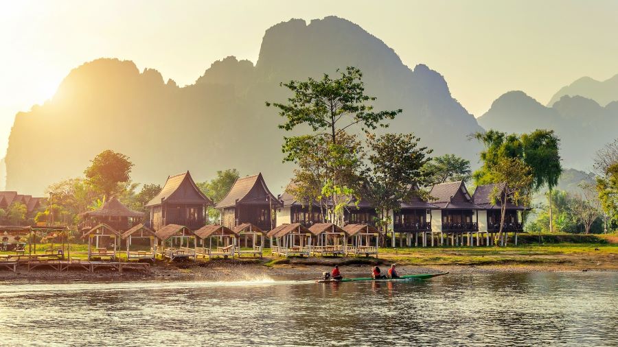 Why visit Vang Vieng? For magical mornings and jaw-dropping limestone mountain views