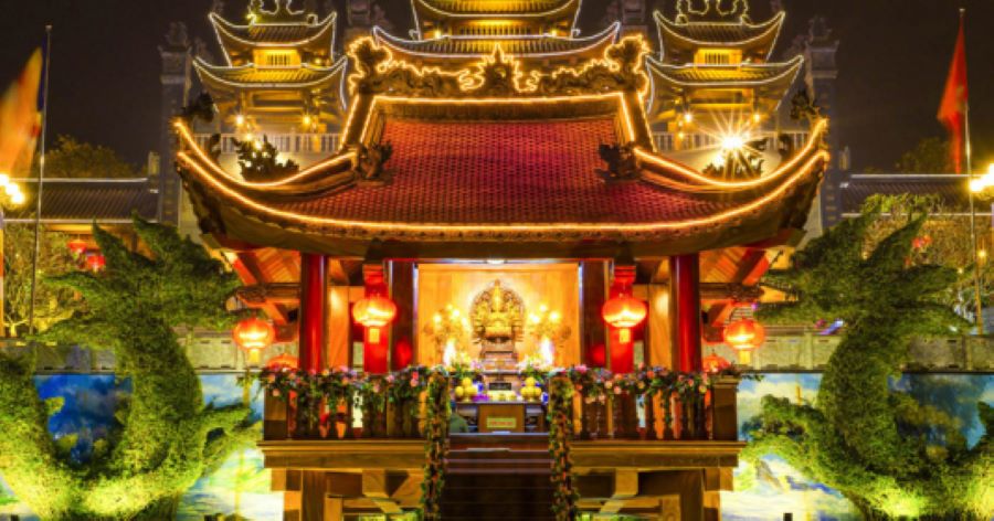 The One Pillar Pagoda glows beautifully during Vesak Day celebrations in Vietnam