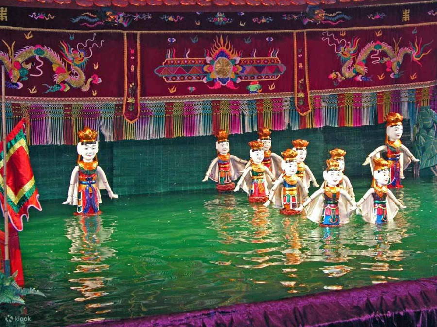 Celebrate Vietnam Spring Flower Festival with a vibrant, cultural water puppet performance display